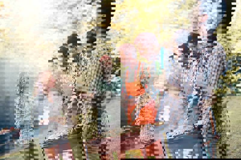 Group Of Friends At A Barbecue Having Non Alcoholic Drinks And Food (2).jpg